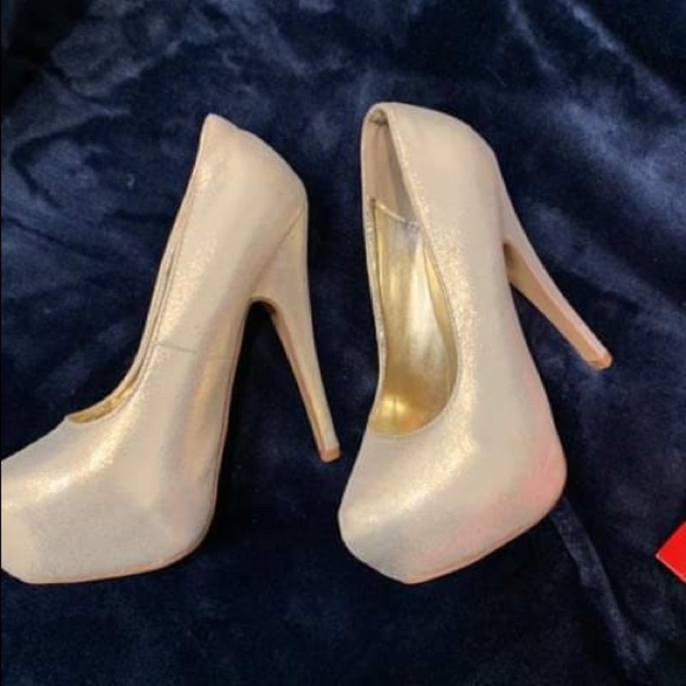 Gold high heels